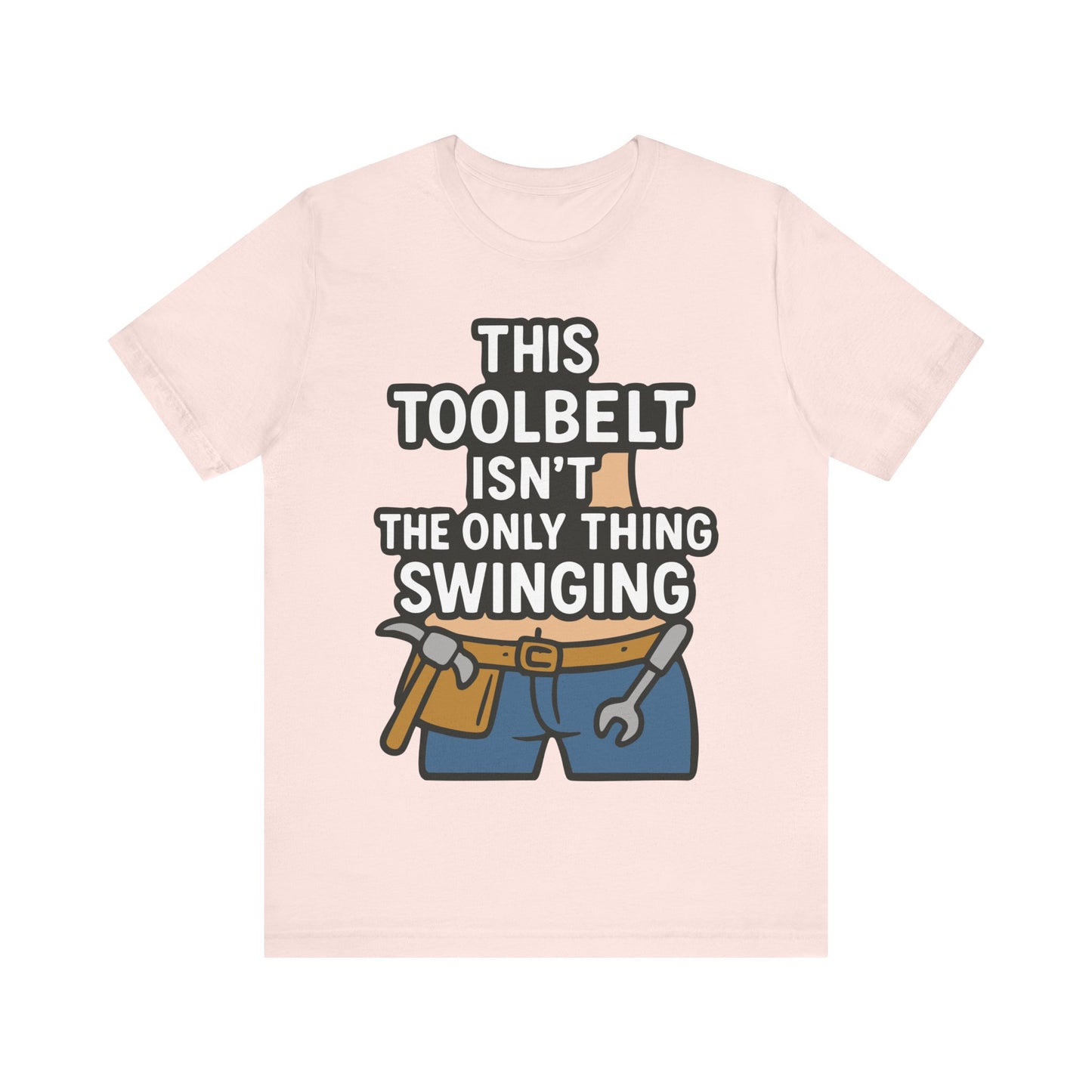 Soft pink t-shirt with a cheeky quote about swinging toolbelts and a cartoon handyman illustration.