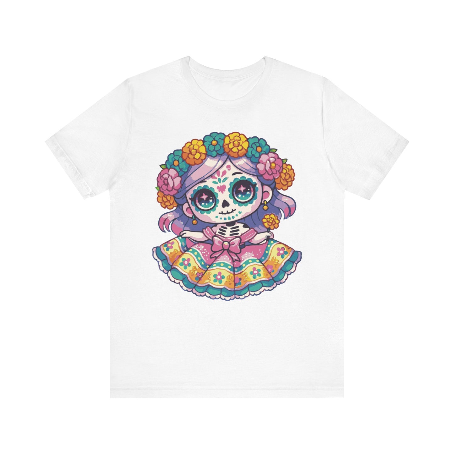 White t-shirt featuring a kawaii chibi sugar skull girl with purple hair, big eyes, colorful sugar skull makeup, a crown of vibrant marigold and rose flowers, and a bright Mexican folk dress with yellow, teal, pink, and floral patterns.