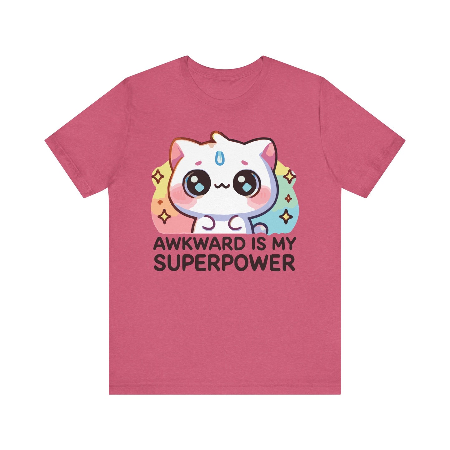 Heather raspberry t-shirt featuring a kawaii pastel cat and the phrase "Awkward Is My Superpower" in bright, playful typography.