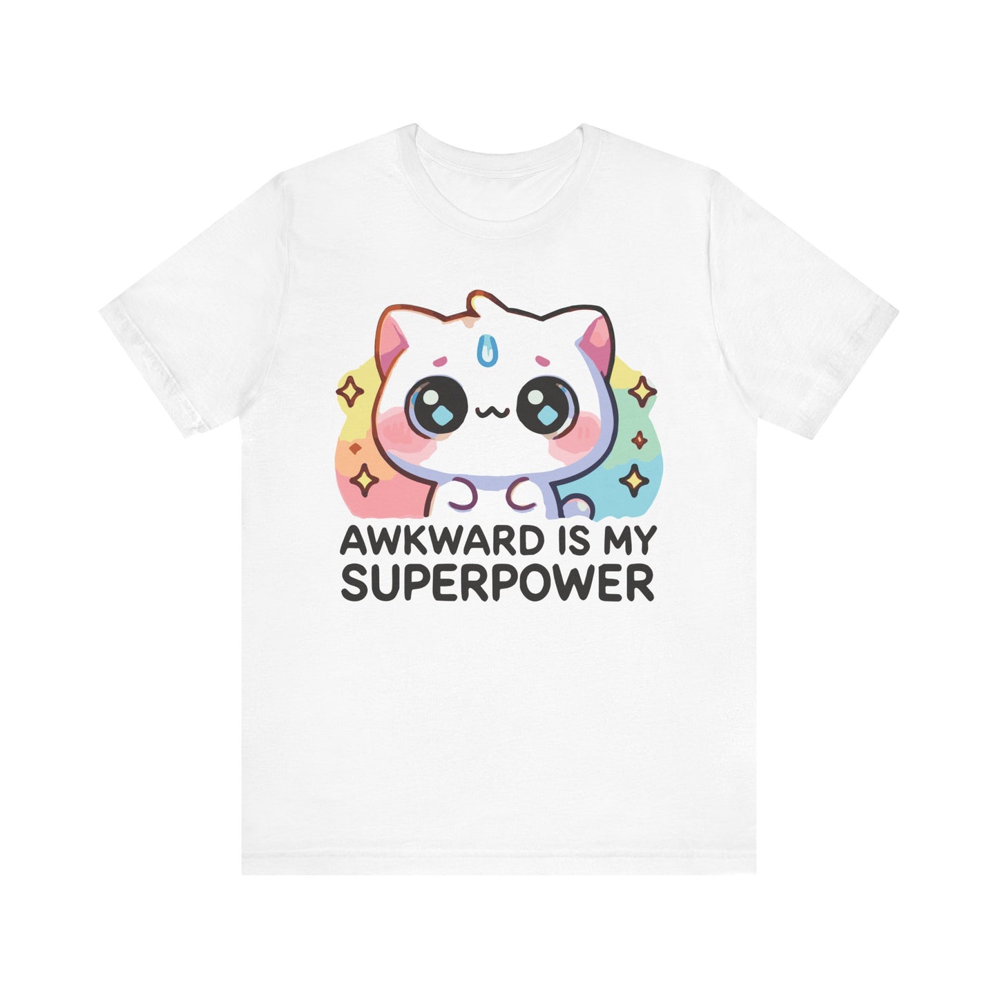 White t-shirt featuring a pastel kawaii cat with sparkles and the phrase "Awkward Is My Superpower" in bold black text.