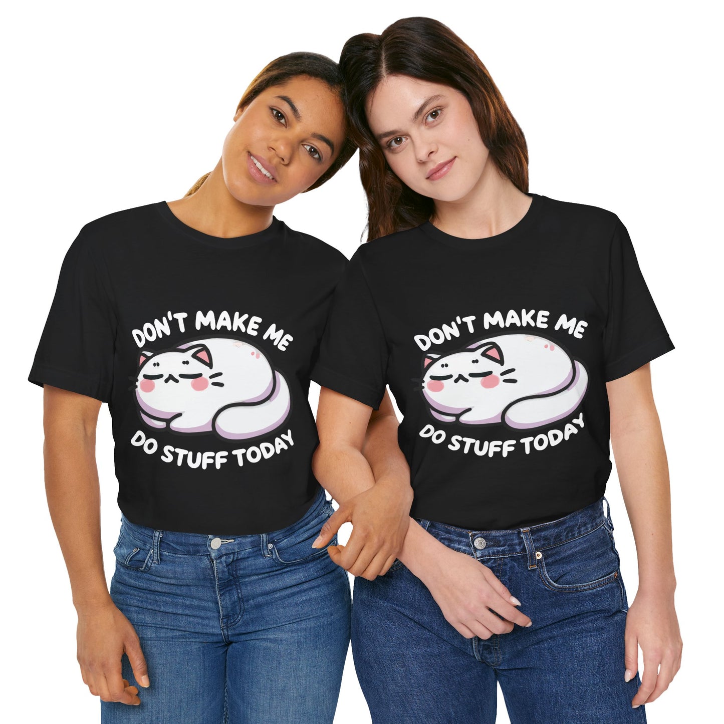 Two women wearing black t-shirts featuring a cute lazy cartoon cat lying down with blushing cheeks and the phrase "Don't Make Me Do Stuff Today" in bold white text.