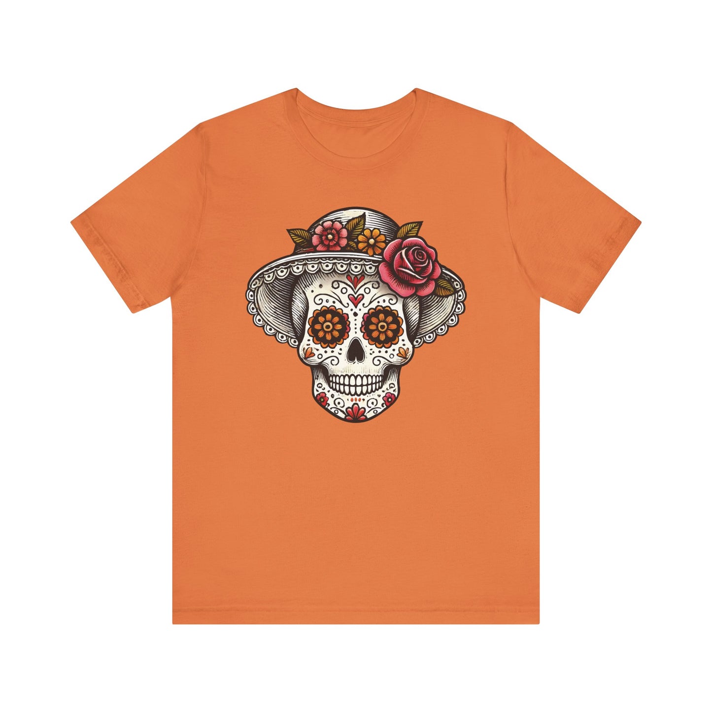 Burnt orange t-shirt with an intricate Catrina skull wearing a lace-trimmed hat and roses, inspired by Mexican traditions.