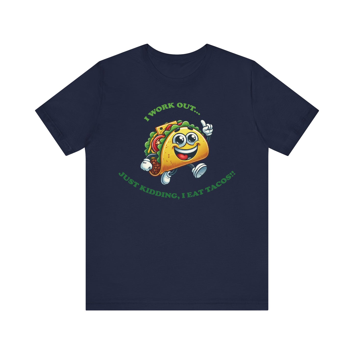 Navy t-shirt with a cheerful cartoon taco character in running shoes and the playful phrase "I WORK OUT... JUST KIDDING, I EAT TACOS!!" in green text.