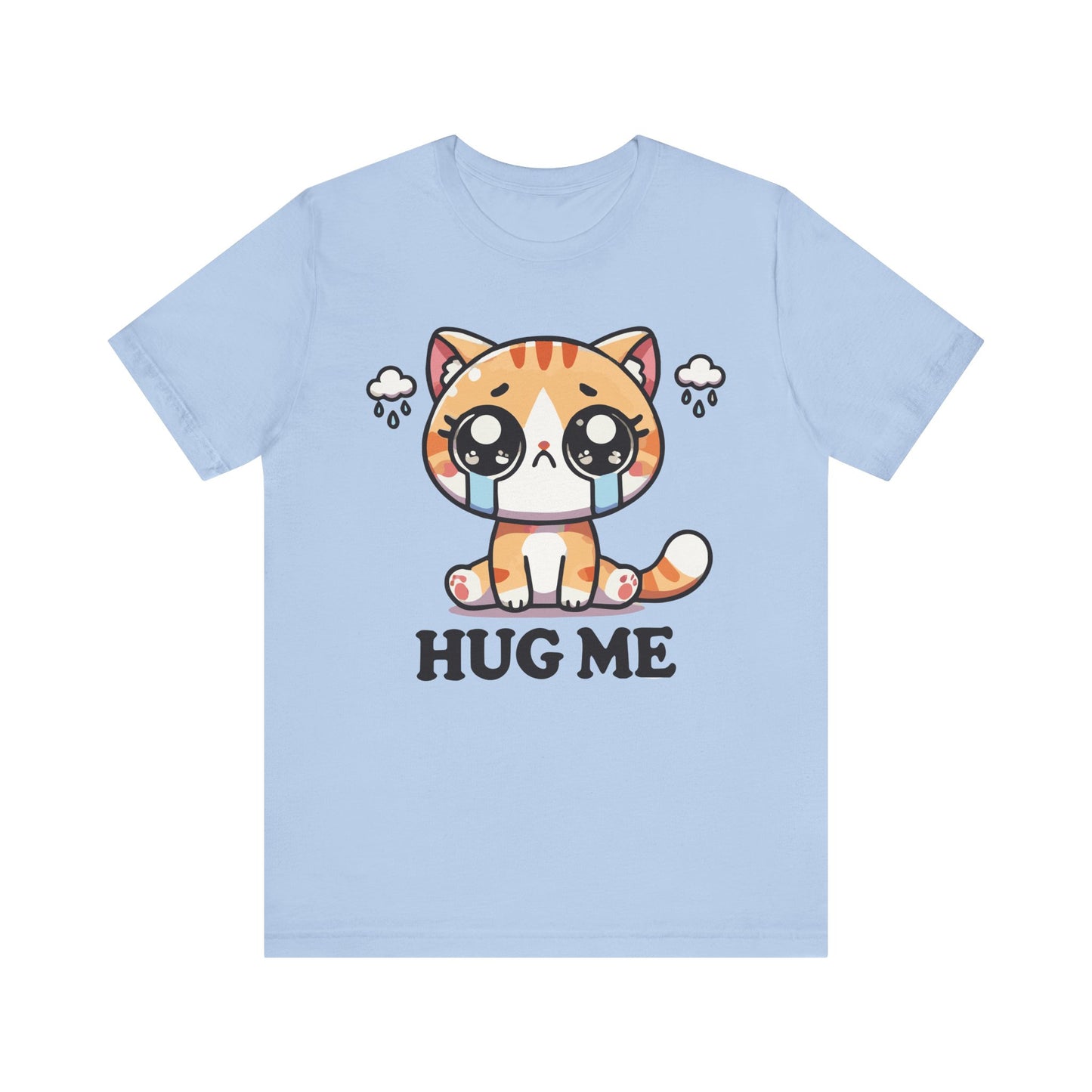 Baby blue t-shirt with a cute crying orange tabby cat and black "Hug Me" text, surrounded by sad cloud icons.