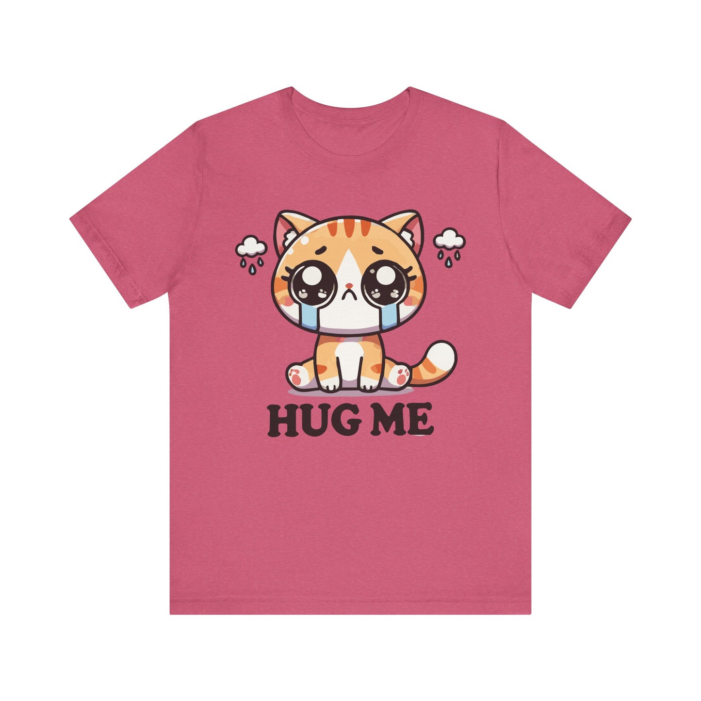 Heather raspberry t-shirt featuring a crying orange tabby with rain clouds and the phrase "Hug Me" in bold font.