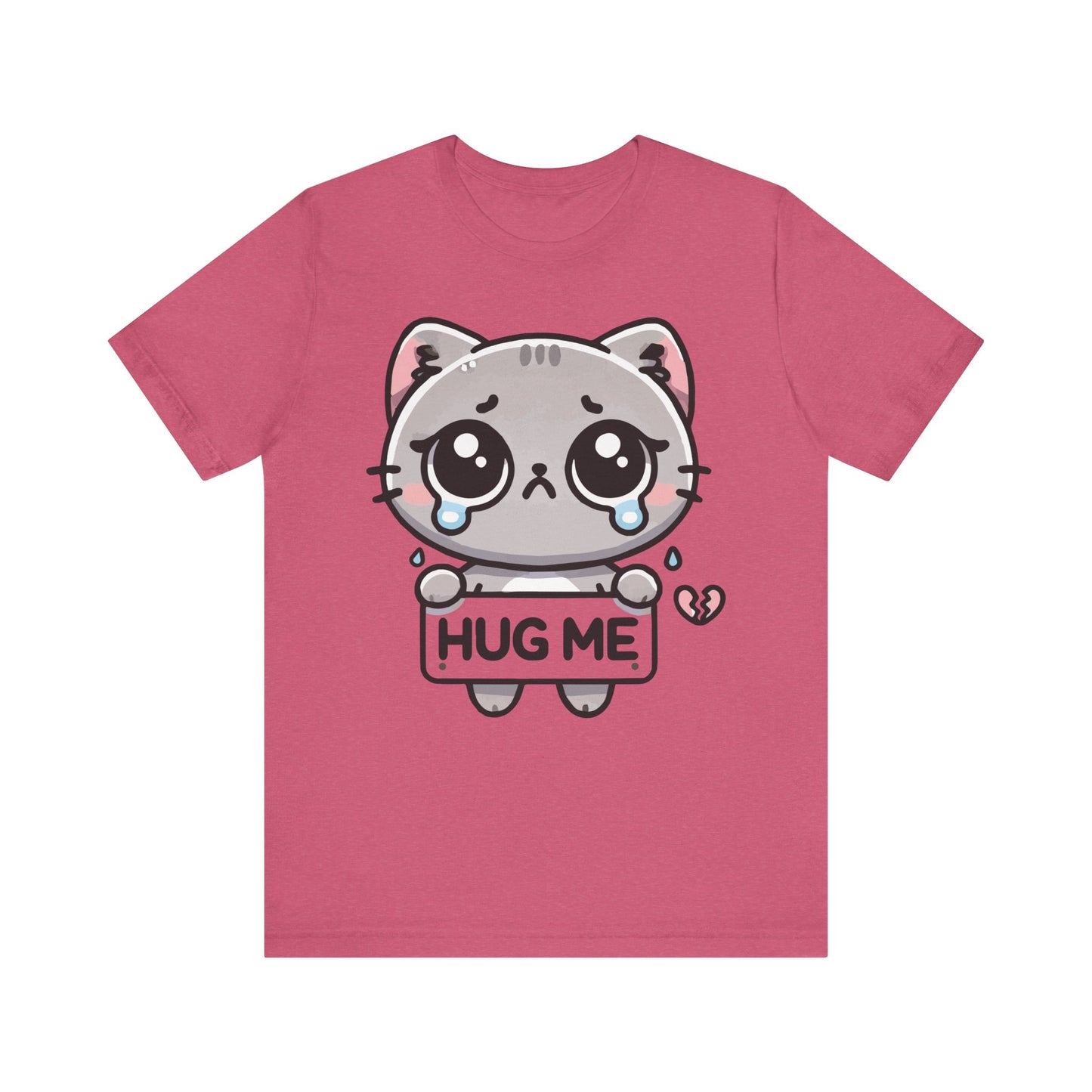 Heather raspberry t-shirt with a crying kawaii-style cat holding a "Hug Me" sign and a small broken heart near the paw.
