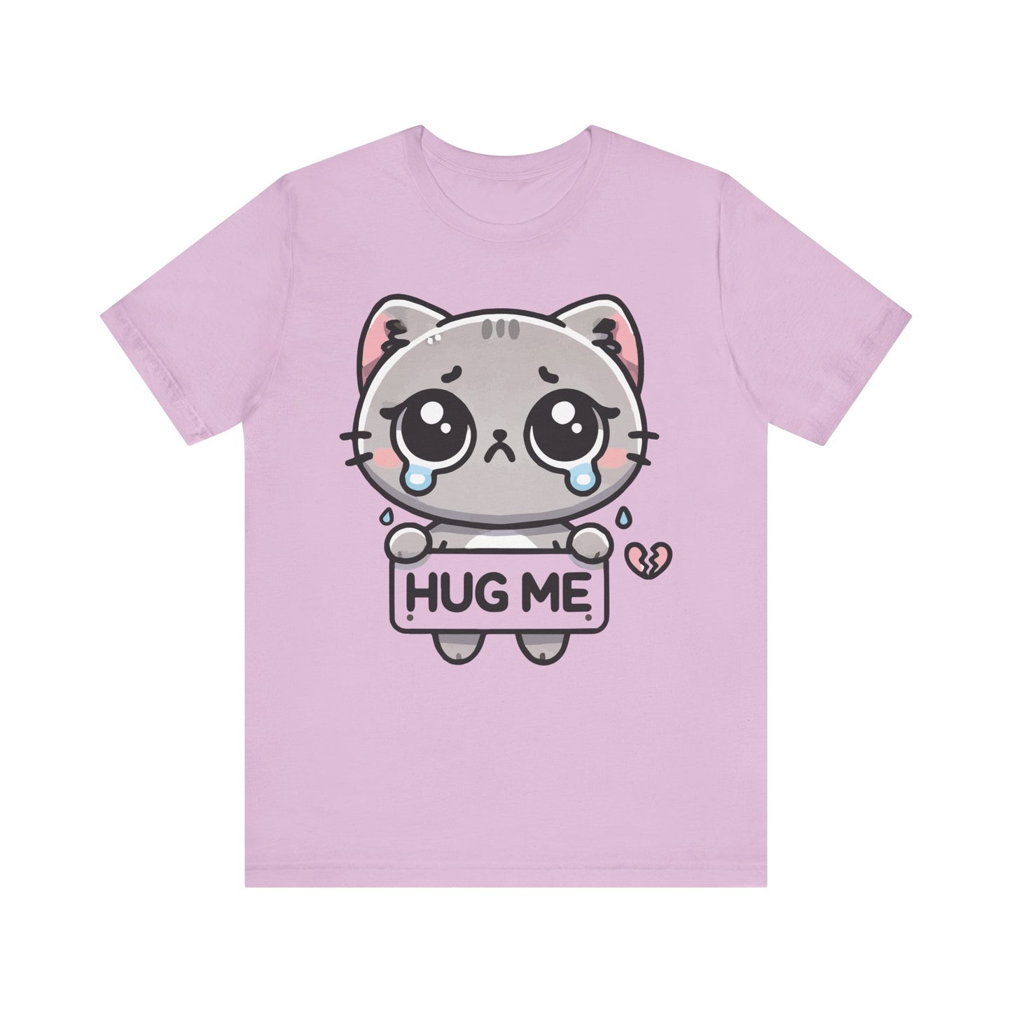 Lilac t-shirt with a crying kawaii grey cat holding a "Hug Me" sign, featuring pastel accents and a broken heart.