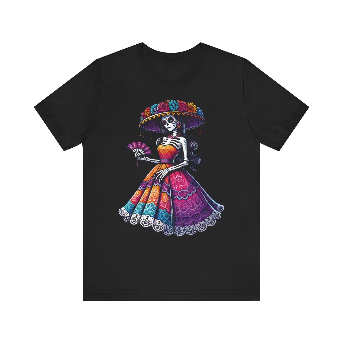 Black t-shirt with a colorful Día de los Muertos design of a skeleton lady (La Catrina) in a bright traditional dress and flowered hat, holding a fan.