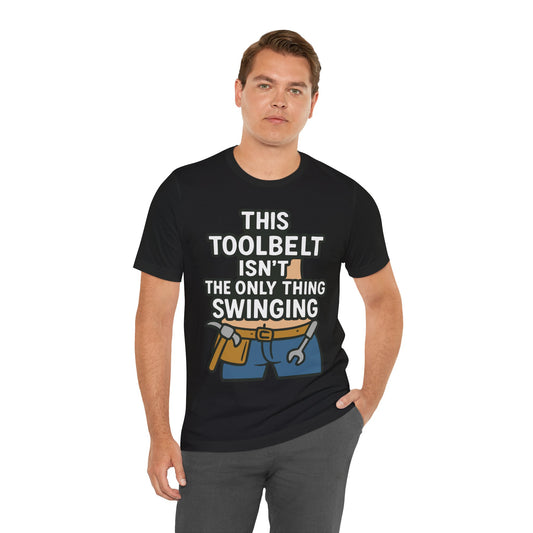 Black t-shirt with cartoon toolbelt graphic and the funny phrase "This Toolbelt Isn’t the Only Thing Swinging."