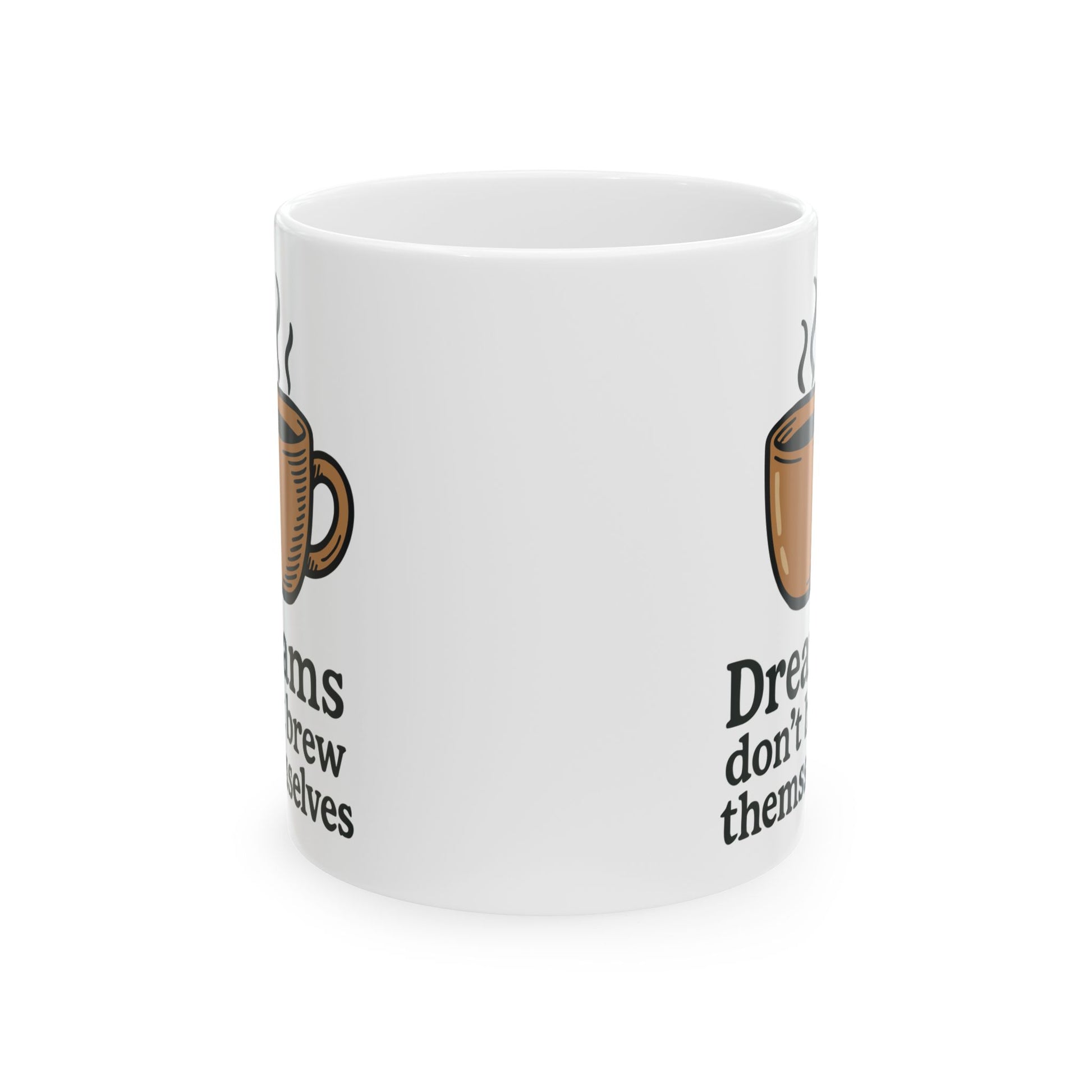 "Dreams Don’t Brew Themselves" white ceramic coffee mug with coffee cup graphic on office desk


