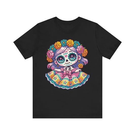 Black t-shirt featuring kawaii chibi sugar skull girl with purple hair, colorful sugar skull makeup, vibrant floral crown, and bright Mexican folk dress.
