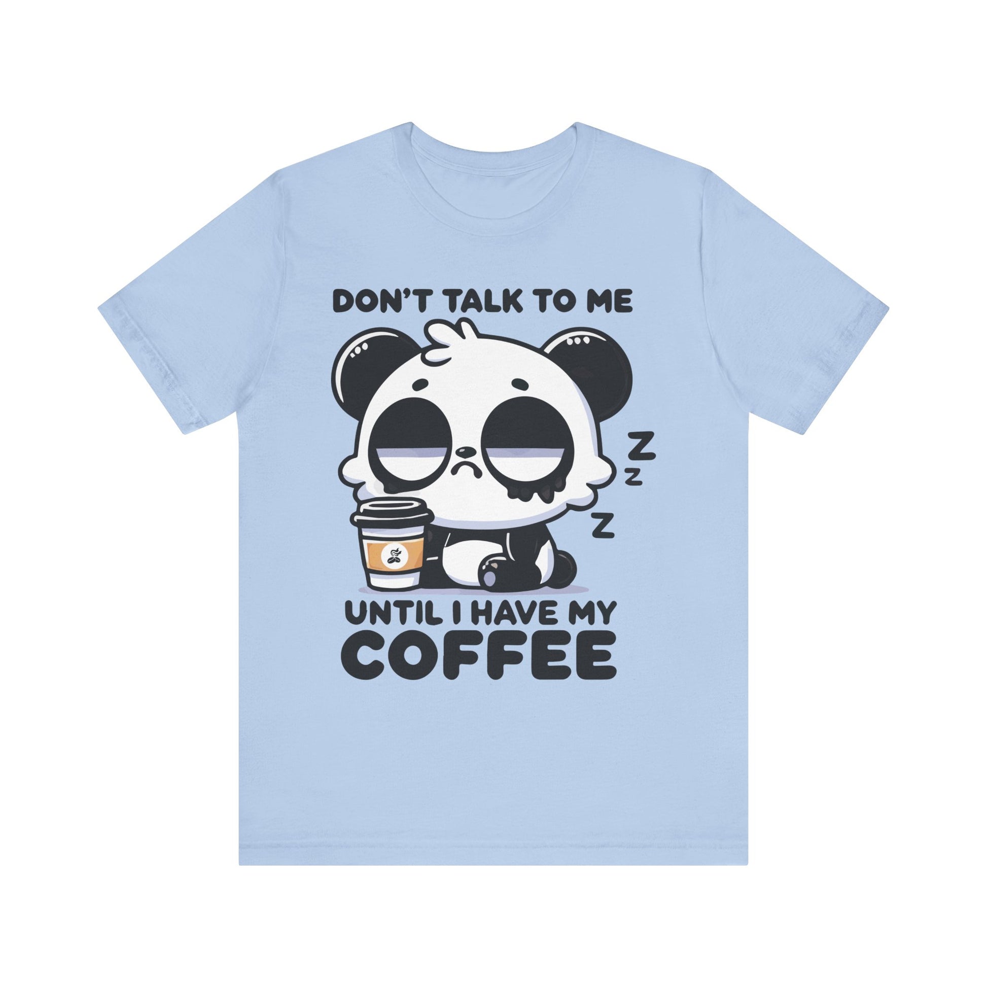 Baby blue t-shirt with a sleepy panda drinking coffee and text that reads "Don’t Talk to Me Until I Have My Coffee"