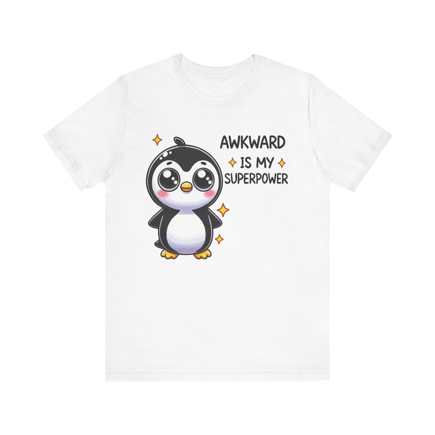 White t-shirt with a cute cartoon penguin and sparkles, featuring the text "Awkward Is My Superpower" in black and orange.
