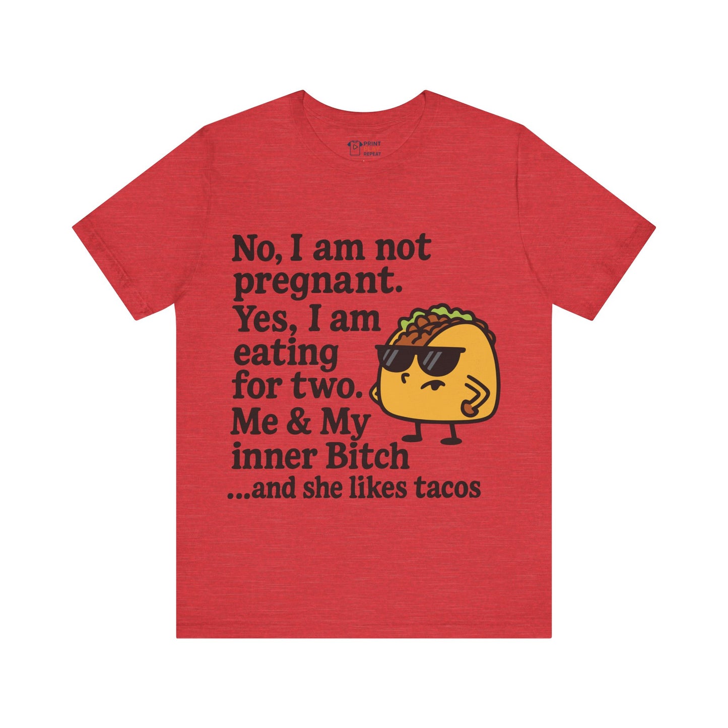 Heather red t-shirt featuring a humorous “eating for two” quote and a taco graphic with attitude.
