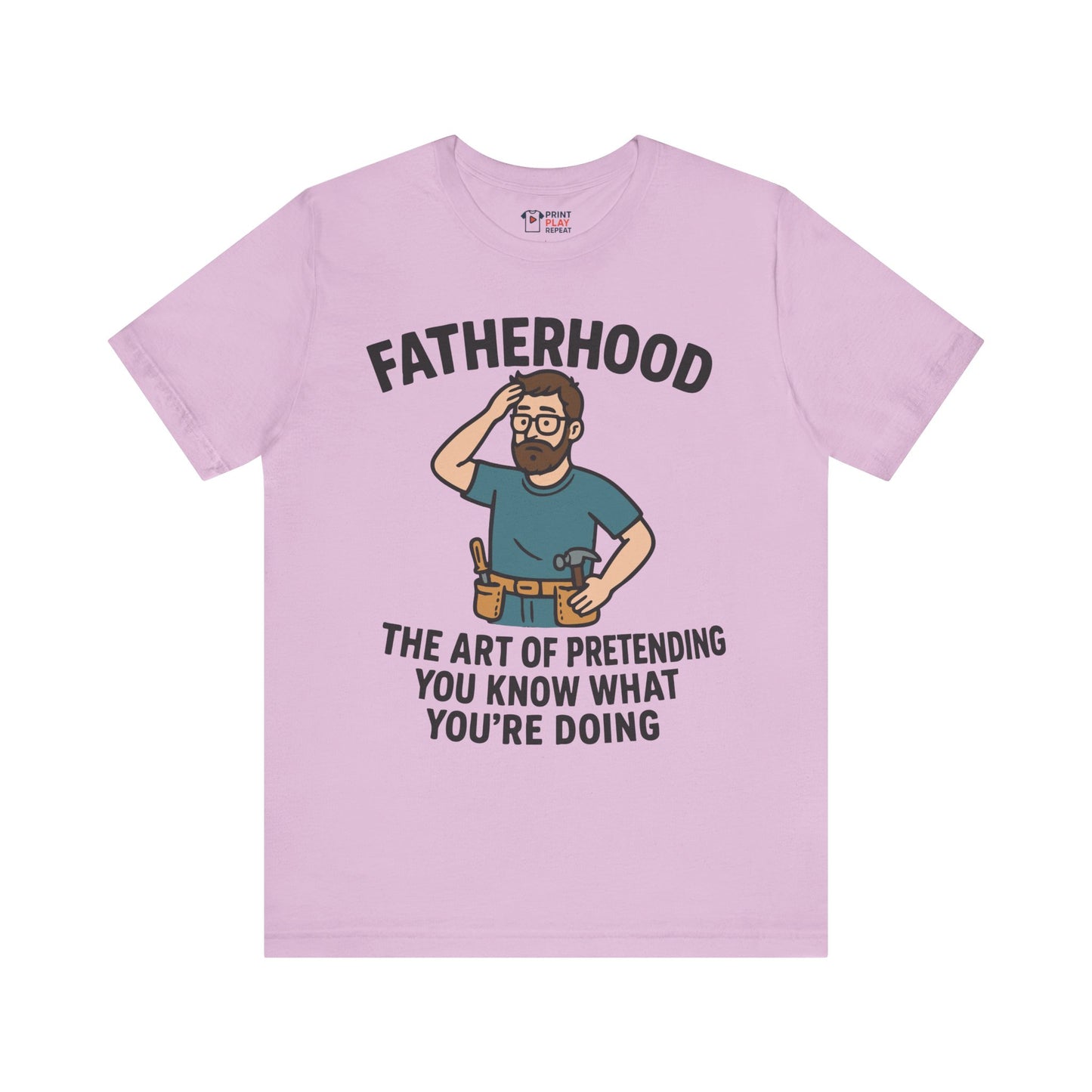 Lilac t-shirt featuring a humorous quote about fatherhood and a cartoon dad figure scratching his head.

