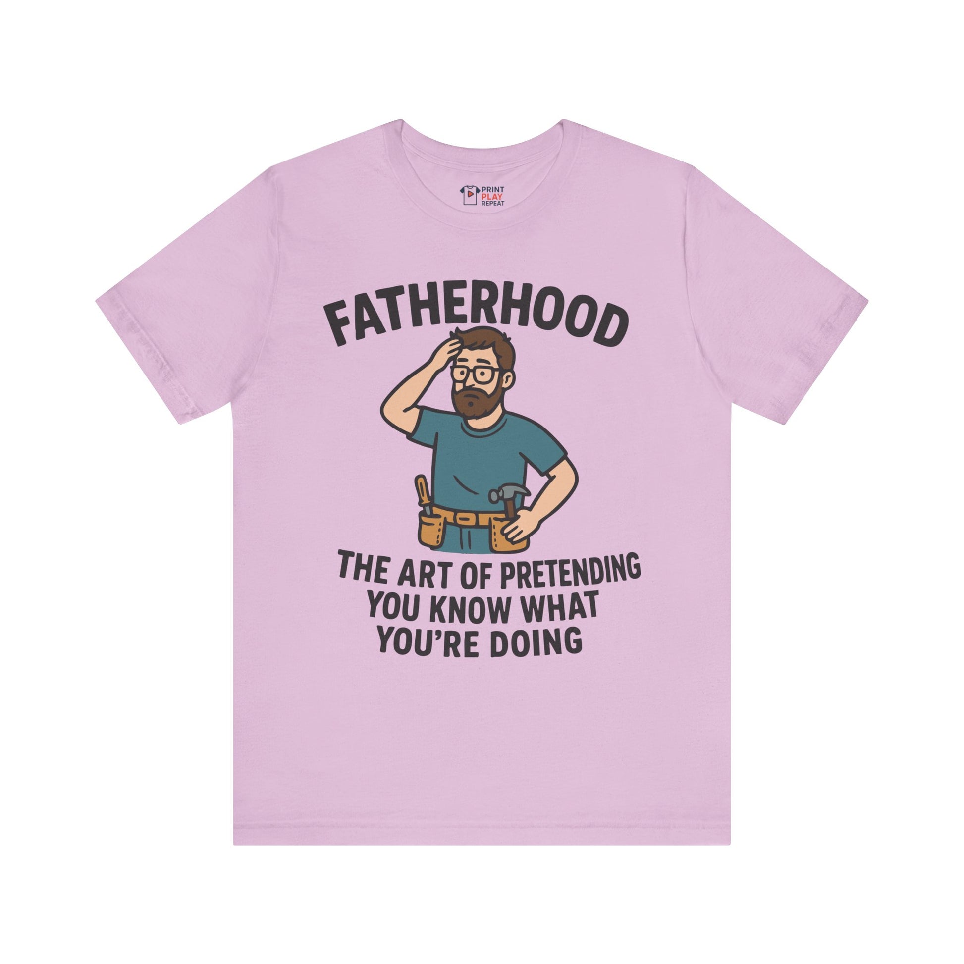 Lilac t-shirt featuring a humorous quote about fatherhood and a cartoon dad figure scratching his head.


