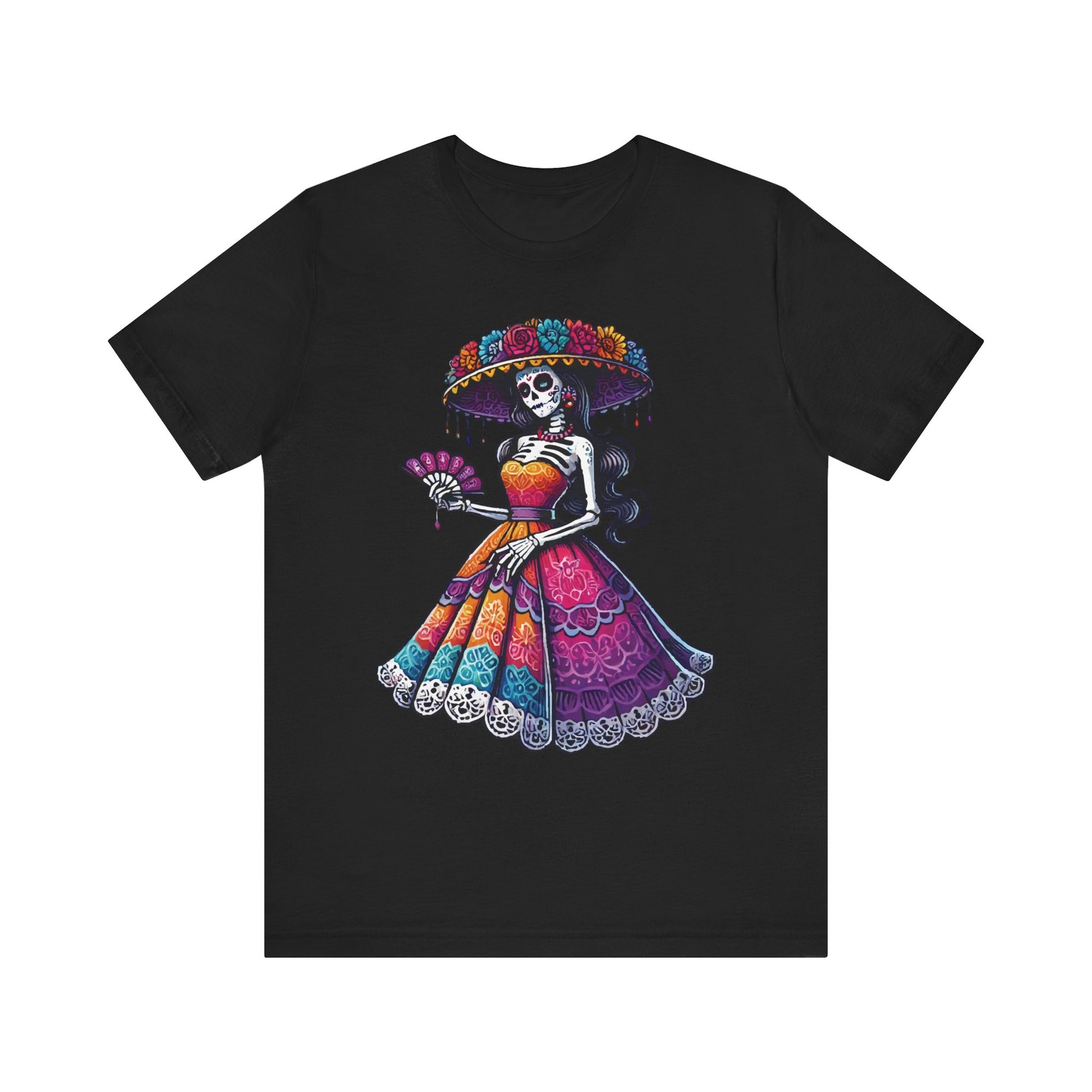 Black t-shirt with a colorful Día de los Muertos design of a skeleton lady (La Catrina) in a bright traditional dress and flowered hat, holding a fan.

